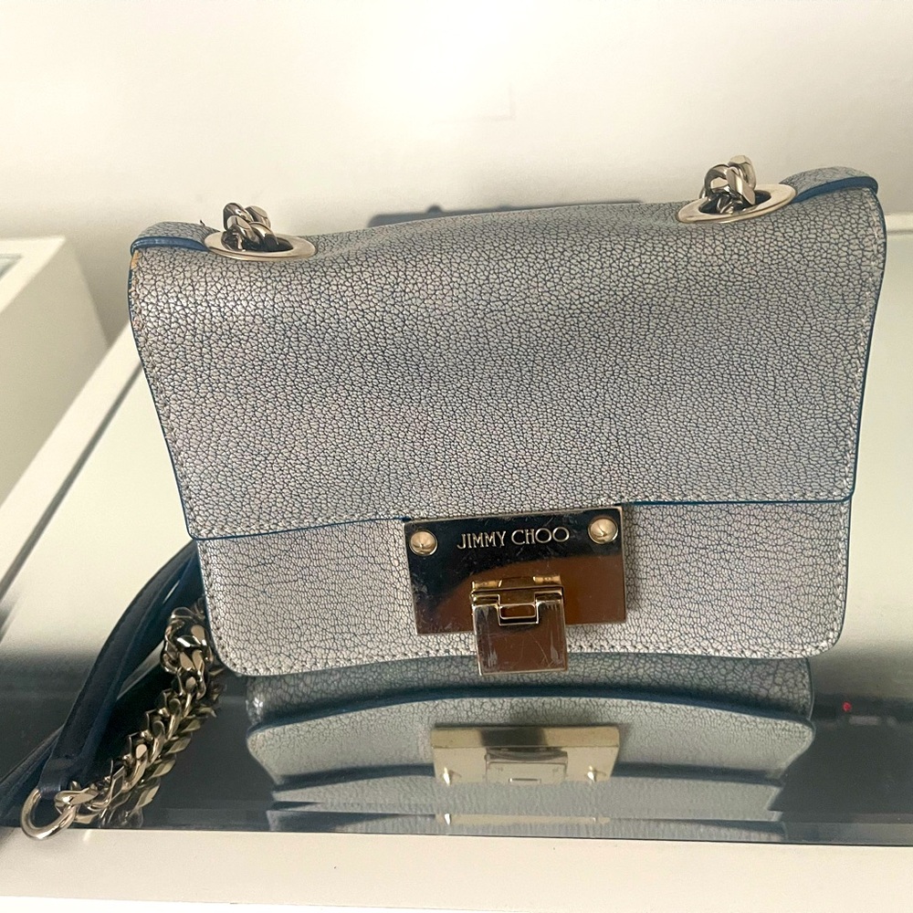 BEAUTIFUL CROSSBODY JIMMY CHOO BAG.. WITH SILVER AND LEATHER STRAP